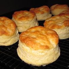 several biscuits cooling on a rack in the oven