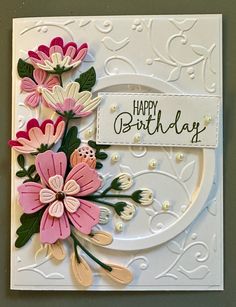 a birthday card with flowers on it