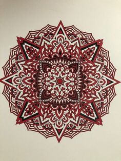 an intricate red and white design is featured in this drawing by the artist, who has been