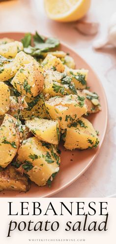 A Lebanese side dish loaded with fresh herbs, lemon, and lots of potatoes! It's a great side dish for any dinner or cookout and couldn't be easier to make. Arabic Potato Salad, Syrian Potato Salad, Middle Eastern Potato Salad, Lebanese Potato Salad, Lebanese Potatoes Recipe, Shawarma Sides, White Potato Recipes, Garlic Potato Salad, Lemon Potato Salad