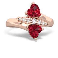 A perfect gift for your loved one, as the ring proudly displays  a lab ruby and a  which sit in a curvy 14K Rose Gold setting, separated by seven dazzling diamonds. The ring  can be customized to include the birthstones of you and your loved one, or perhaps your children.This is a ring that will sweep her off of her feet and show her how much you care. Luxury Lab-created Ruby Birthstone Ring With Prong Setting, Luxury Gift Lab-created Ruby Ring, Luxury Lab-created Ruby Birthstone Ring, Luxury Yellow Gold Jewelry With Lab-created Ruby, Ruby Heart, Heart To Heart, Yellow Gold Setting, Ruby Jewelry, Rhinestone Studs