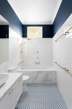 the instagram page shows an image of a bathroom with blue and white tile