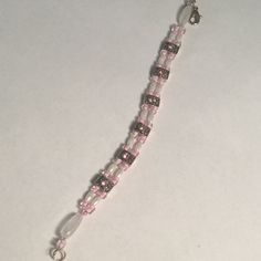 This Sweet Little Bracelet Has Pink Rhinestones, Pink Lined Glass Seed Beads, White Seed “Pearls”, And Pink Quartz. Silver Color Lobster Closure. The Length Can Be Adjusted If You Let Me Know When You Order. It Measures 7”. Can Be Made Longer, But Not Shorter. Pink Rhinestone Beaded Bracelet As Gift, Diy Choker, Bead Choker, Seed Pearl, Glass Seed Beads, Pink Rhinestones, Pink Bracelet, Pink Quartz, Beaded Choker