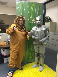 two people in costumes standing next to each other