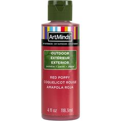 a bottle of red paint with green cap