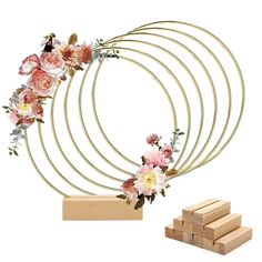 PRICES MAY VARY. Package included: 6 pieces 10 inch gold metal rings with 6 pieces natural wooden card holder Dimension details: These gold floral rings are 10 inch(25cm) in diameter; Thickness: 3 mm, and the wooden stand is 3.15 x 1.18 x 0.79 inch (8 x 3 x 2cm), they can be perfectly combined to make wedding table centerpieces decor Material: These gold floral hoops are made of sturdy and durable metal which surface has glazed, it is anti-oxidation and anti-rust. The wooden stand is made of nat Dream Catcher Crafts, Hoop Centerpiece, Stand For Table, Hanging Wreaths, Table Wreath, Wooden Stand, Wreath Decor, 6 Pack, Metal Rings