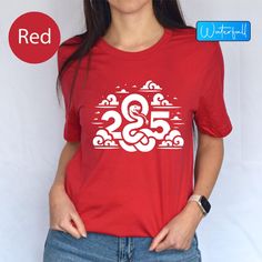 2025 New Year Happy Chinese Snake Tshirt, Chinese Year Of Snake 2025 Gift Shirts , Gift For New Year Snake 2025 Tee, Happy New Year Gift Tee Ring in the 2025 New Year with a ""Happy Chinese New Year"" Snake T-Shirt! Celebrate the ""Chinese Year of the Snake 2025"" in style with this unique ""Snake 2025 Tee."" Featuring a bold and vibrant design, this t-shirt is perfect for commemorating the ""2025 Chinese Year"" with family and friends. Whether you are looking for a festive outfit or a thoughtfu New Year Red Letter Print T-shirt, Red Letter Print T-shirt For New Year, New Year Red T-shirt With Graphic Print, Red Graphic Print T-shirt For New Year, New Year Graphic Print Short Sleeve T-shirt, Red Short Sleeve T-shirt For New Year, Red Letter Print Top For New Year, White Short Sleeve T-shirt For New Year, Snake Tshirt