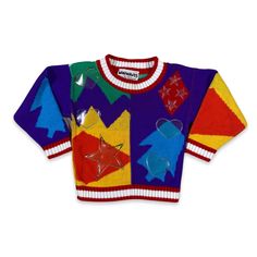 "Vintage 80s Color Block Pullover Sweater -Tag: Miniwaves -100% acrylic -Color block with plastic accents of stars and hearts -Tagged Size: None given. Measures to around a size 2T -The best way to ensure a proper fit is to compare our measurements to the measurements of a similar item you own that fits well. Measurements (approx.) -pit to pit: 11\" -length: 12\"" Multicolor Fall Sweater For Playtime, Retro Winter Color Block Sweater, Playful Multicolor Sweater For Playtime, Handmade Vintage Multicolor Sweater, Oversized Multicolor Retro Sweater, 90s Multicolor Winter Sweater, Vintage Multicolor Color Block Sweater, Baby Sweaters, Acrylic Colors