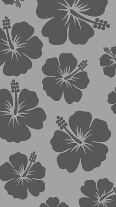 a gray and white flower pattern on a grey background