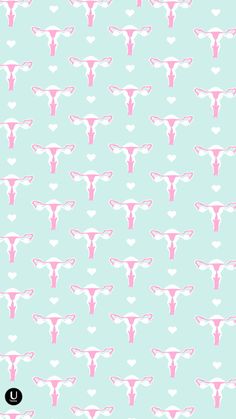 a pattern with pink and white shapes on a blue background that looks like the shape of a cow's head