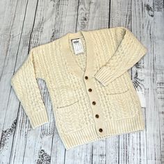 Brand New Adorable Cream Wool Cardigan From Brandy Melville. Approx Length From Top Of Collar To Hem Is 27” And Sleeve From Seam To Band Is 19.5”. Great Classic Sweater With Two Pockets And Brown Buttons. Brandy Melville Sweaters, Cream Cardigan, Classic Sweater, Wool Cardigan, Brandy Melville, Brandy, Sweaters & Cardigans, Lounge Wear, Sweaters For Women