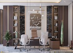 an office with two chairs and a desk in front of a bookcase filled with books