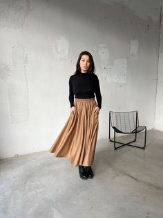 Step into effortless sophistication with our long cold wool skirt, a high-fashion piece that blends elegance with everyday practicality. Crafted from luxurious cold wool, this skirt drapes beautifully, offering a refined silhouette that moves gracefully with you. The elastic waistband ensures a comfortable, flexible fit, while discreet side pockets add a functional touch. Perfectly tailored and crafted, this skirt is designed for those who appreciate high-quality fabrics and timeless design. Its versatile, polished look makes it a standout piece for any occasion, whether dressed up or down. ◼ FIT This wool skirt is of regular fit. To have the same look as on our model, please check our body measurements size chart below, especially the waist measurement, and choose the correct size for you Maxi Skirt With Pockets, Women Circle, Maxi Rock, Boho Plus Size, Boho Rock, Skirt Draping, Plus Size Skirt, Skirt Wool, Long Maxi Skirt