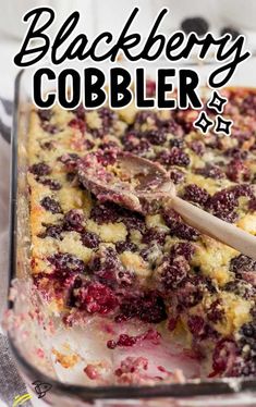 a close up of a casserole dish with berries on it and the words blackberry cobbler above it