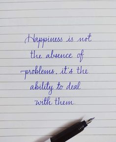 a note with the words happiness is not the presence of problems it's the ability to deal with them