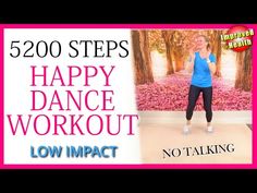 a woman in blue shirt and black leggings standing next to pink background with the words happy dance workout low impact