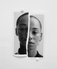 a black and white photo of a woman's face through a torn piece of paper