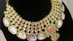 This beautiful choker is a modern twist to traditional jewelry and comes in a gold finish to match any outfit as desired. The choker is made of high quality stones and is a statement piece that can be dressed accordingly. The set comes with matching earrings and Tikka for a complete look. Heavy Elegant Gold-plated Kundan Necklace, Designer Gold Necklaces, Elegant Handmade Kundan Jewelry Sets, Handmade Elegant Kundan Jewelry Sets, Handmade Kundan Jewelry Sets, Traditional Gold-plated Necklace For Parties, Traditional Gold Plated Necklaces For Parties, Designer Gold-plated Silver Jewelry, Festive Gold-plated Kundan Choker Necklace