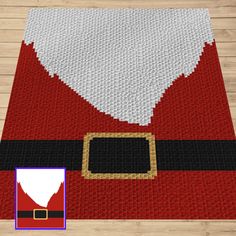 a santa clause rug with a black and white hat