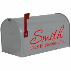 a gray mailbox with the name smith 122 buckingham in red on it