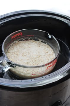 rice is being cooked in the slow cooker