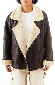 An asymmetric zipper lends moto-inspired edge to this oversized aviator jacket crafted from vintage-inspired faux leather and lined with plush faux shearling. 28" length (size Medium) Exclusive retailer Asymmetric zip closure Notched lapels Front patch pockets 51% viscose, 49% polyester with polyurethane coating; 100% polyester faux-shearling contrast Dry clean Imported Suede Outfit, Streetwear Mode, Aviator Jackets, Aviator Style, Business Outfit, Shearling Jacket, Short Jacket, Outerwear Coats, Faux Leather Jackets