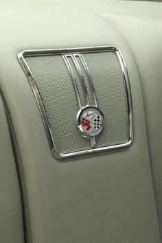 the emblem on the front seat of a car