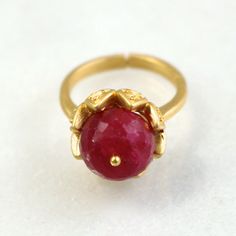 A stunning and luminous 12mm raspberry red ruby stone is set into a 22k gold over sterling vermeil setting. This stone absolutely glows from every single angle. The size is fully adjustable on the very comfortable band. An absolute one and only fine gemstone ring. Raspberry Red, Wax Casting, Cabochon Ring, Ruby Stone, Lost Wax, Red Ruby, Fringe Earrings, Saint Louis, 22k Gold