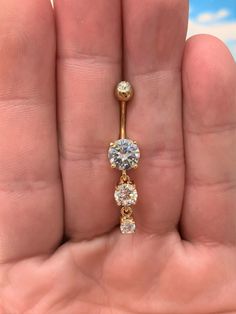 Golden dangly triple cz Belly ring..14G..10mm(B07G) Dangly Belly Piercing Ideas, Golden Belly Piercing, Gold Belly Piercing, Belly Piercings, Bellybutton Piercings, Belly Button Piercing Jewelry, Belly Piercing Jewelry, Belly Bar, Belly Button Jewelry