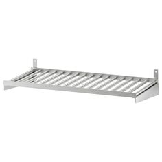 a metal shelf that is on the wall