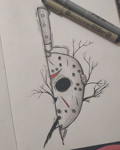 a drawing of a mask with a knife stuck in it