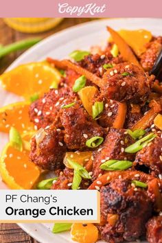 an orange chicken dish on a white plate