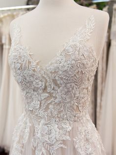 the back of a wedding dress on display at a bridal shop in london, england