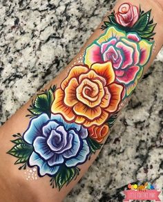 a woman's arm with flowers on it and the words instagramn written below