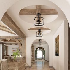 a long hallway with wooden beams and ceiling lights on either side of the hall, leading to another room