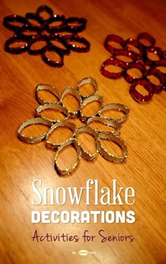 three snowflake decorations on a wooden table with text that reads, activities for seniors