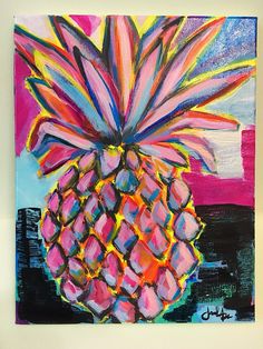 a colorful painting of a pineapple on a white wall with pink, blue and yellow colors