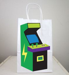 a paper bag with an arcade game on it