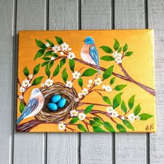 a painting of two birds sitting on a branch with eggs in it's nest