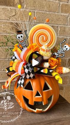 a pumpkin decorated with candy and candies