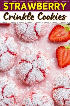 strawberry crinkle cookies with powdered sugar and fresh strawberries on the side