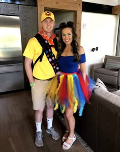 a man and woman dressed up in costumes