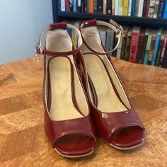 Product Description: ***New Without Tags***Scratch On Back Of Left Shoe***See Picture** Peep-Toe Pump Fashioned With An Ankle Strap And A Block Heel. 2.75'' Heel Buckle Closure Man-Made Upper Man-Made Lining Rubber Sole Imported Burgundy Heels With Red Sole For Spring, Burgundy Round Toe Heels For Spring, Fitted Burgundy Heels With Round Toe, Spring Burgundy Heels Of Medium Width, Fitted Burgundy Round Toe Heels, Burgundy Fitted Round Toe Heels, Burgundy Round Toe Heels, Red Block Heels With 4-inch Heel And Round Toe, Red 4-inch Heel Block Heels For Evening