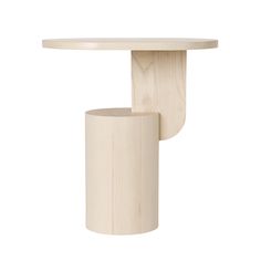 a white table with a wooden base and a round top on the side, against a white background