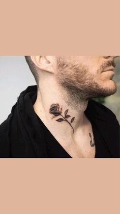 a man with a rose tattoo on his neck