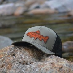 Custom Brook Trout Leather Patch Hat. This trucker style hat is perfect to add your personalized touch to. Choose from our variety of hat color and leather color options. Fish patch engraved into our high quality leather patch hat. PRODUCT DETAILS -------------------------- ~ Richardson 112 trucker style snapback hats ~ Brook Trout on our high quality 100% genuine leather patch hats ~ Hat Color Options: Black, Navy, Heather Gray / Black, Charcoal / White, Navy / White, Charcoal / Black, Black / Adjustable Trucker Hat For Fishing, Trucker Hat With Flat Bill For Fishing, Trucker Hat For Fishing With Flat Bill, Trucker Baseball Cap For Fishing, Casual Brown Trucker Hat For Fishing, Casual Brown Hats For Fishing, Curved Brim Trucker Hat For Fishing, Brown Trucker Hat With Short Brim For Outdoor Activities, Brown Curved Brim Trucker Hat For Fishing