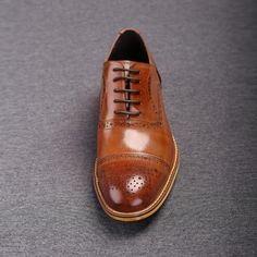 Brown Oxford shoes are life-savers of a sort because they can be worn with almost anything! Since these are high-quality ones, you can rest assured they will go equally well with jeans and tweed. This pair will be a great addition to any unique shoe collection. These oxfords can be worn with 2- and 3-piece business suits and casual suits, whatever suits your taste! Suits with bold patterns and material blends will also be perfect with these shoes. No matter which color suit you are wearing, these shoes go along with every shade. Be it grey, dark brown, or navy colored suits. In fact, many style experts prefer them over wearing black due to their far more visually striking effect. The shoes are constructed from 100% Genuine Leather for maximum durability The only premium quality leather is Leather Wingtip Lace-up Shoes For Fall, Fall Season Brogue Oxford Leather Shoes, Fall Derby Wingtip Leather Shoes, Leather Wingtip Oxfords For Fall, Wingtip Leather Shoes For Derby In Fall, Fall Wingtip Lace-up Shoes With Leather Sole, Fall Dress Shoes With Leather Sole, Fall Business Leather Shoes With Brogue Detailing, Fall Oxford Dress Shoes With Leather Sole