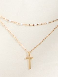 This gold layered necklace features a cross and some ivory detailing. We love this dainty necklace with a low neckline dress or top!! Low Neckline Dress, Dahlia Necklace, Gold Layered Necklace, Low Neckline, Neckline Dress, Gold Necklace Layered, A Cross, Accessories Jewelry Necklace, Altar'd State