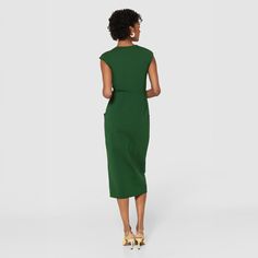 The forest green of this Ponte dress is sublime. It’s not too bright and offers a welcome change from black and navy. It features a notched V-neck, grown-on cap sleeves, a panelled pencil skirt with a centre front split, and pockets. 68% Viscose, 27% Nylon, 5% Elastane.  Care Instructions: Wash according to instructions on care label.