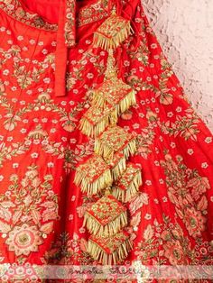 Red And Rose Pink Raw Silk Bridal Lehenga With Embroidery And Net Dupatta (Set of 3) Fabric details: Lehenga - Raw Silk Blouse - Raw Silk Dupatta - Net Embroidery: Lehenga - Zardosi, Resham And Sequence Work Blouse - Zardosi, Resham And Sequence Work Dupatta - Zardosi, Resham And Sequence Work Wash Care Instructions: Dry clean only Note: This product is made to order. No returns The product will be shipped within 4-6 weeks of the order placed Traditional Silk Lehenga With Gota Work, Ceremonial Kundan Sets With Embroidery, Ceremonial Red Embroidered Sharara, Red Ceremonial Sharara For Festivals, Red Silk Thread Sharara For Wedding, Ceremonial Lehenga With Gota Work For Festivals, Ceremonial Lehenga With Dori Work For Diwali, Ceremonial Festive Choli With Dori Work, Ceremonial Lehenga With Gota Work For Diwali